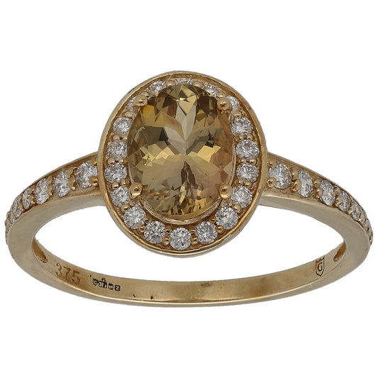 9ct gold dress ring with oval spodumene center and round diamond shoulders