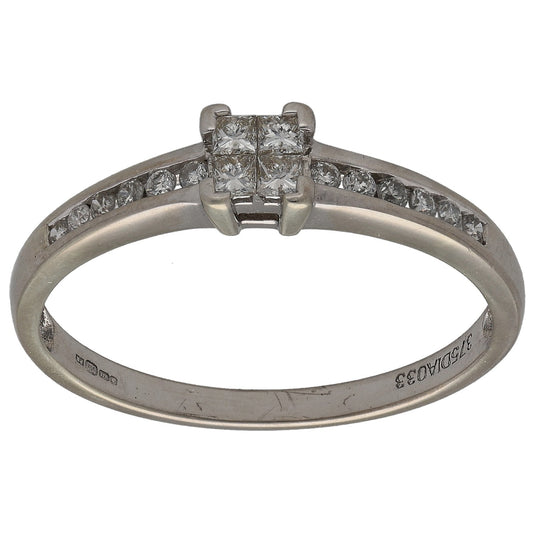 White gold cluster diamond ring with princess center and round side stones