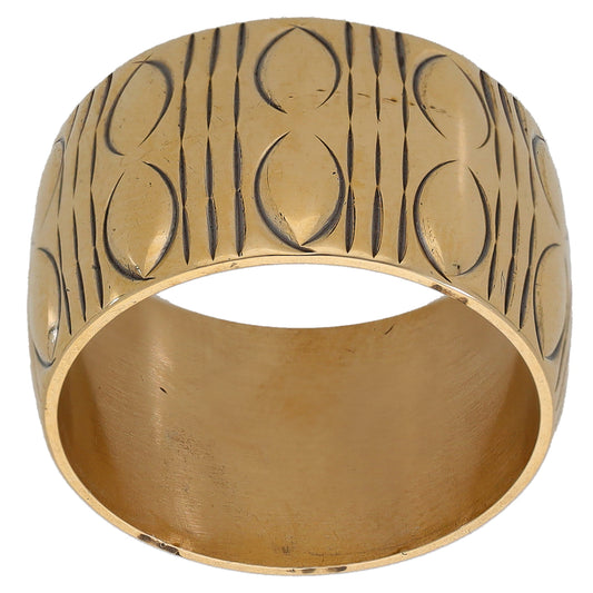 Gold wedding ring with raised engraved circle and line pattern, open inside