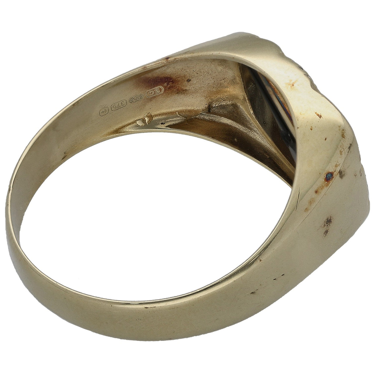 Gold signet ring back view with engraved interior markings