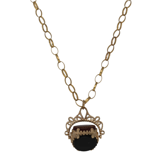 9ct gold fob pendant necklace with oval dark stone and ornate openwork frame
