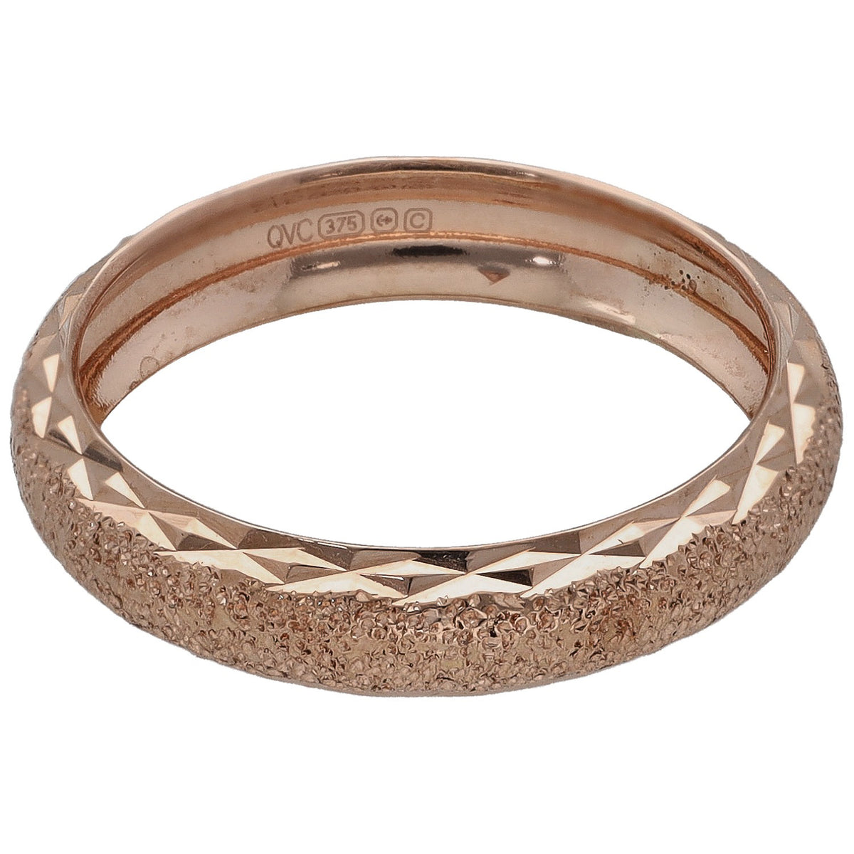 Rose gold wedding ring with faceted inner band and hallmark stamps inside