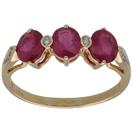 Three-stone ruby and diamond 18k gold ring with round side diamonds
