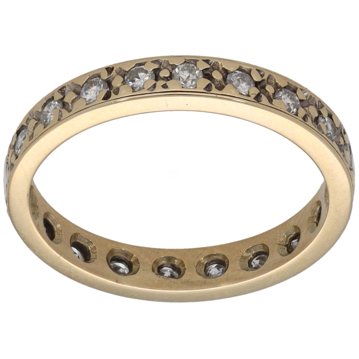 Gold eternity ring with round diamond accents, channel-set across the top and sides