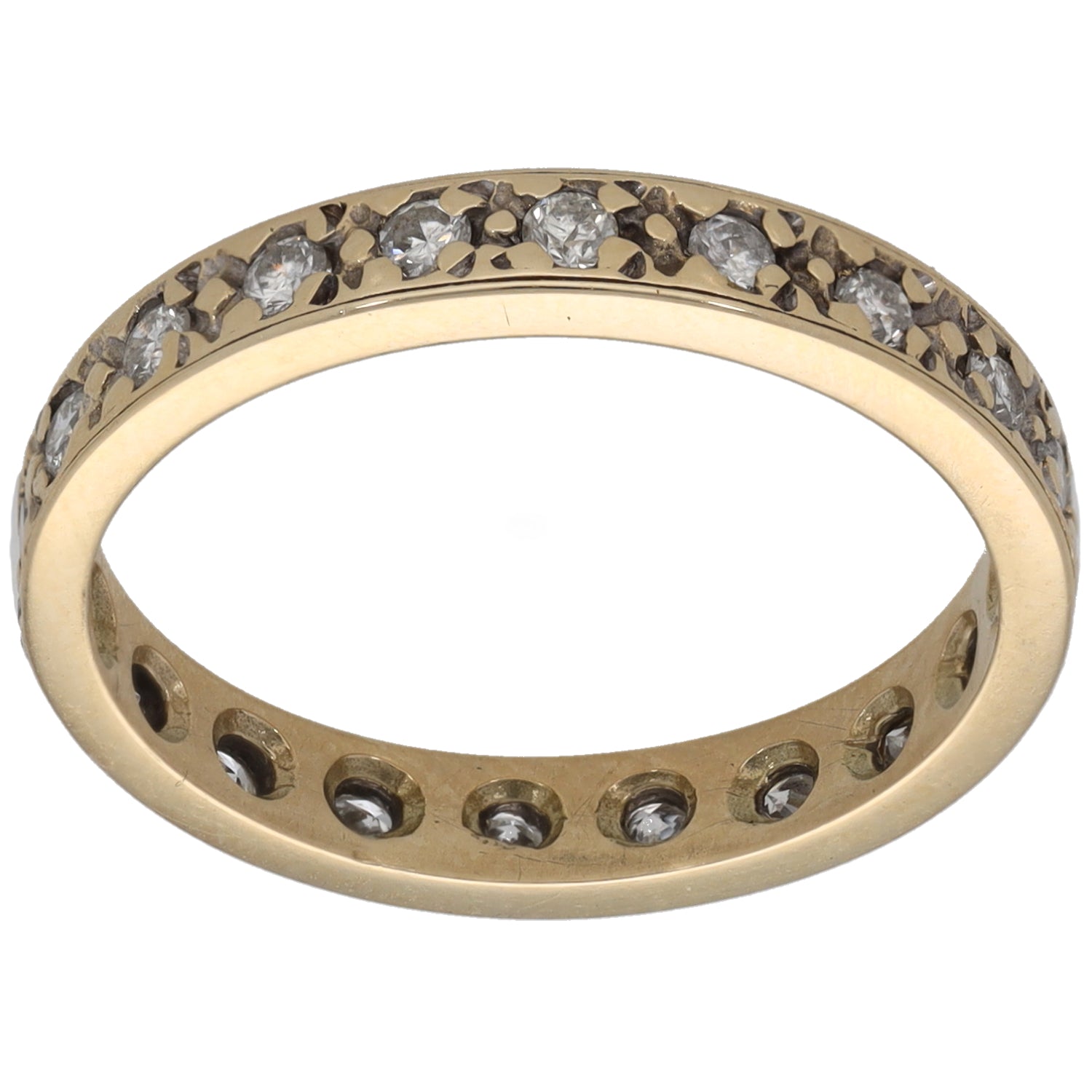 Gold eternity ring with round diamond accents, channel-set across the top and sides
