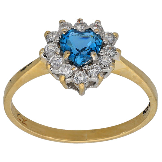 9ct gold ring with blue heart-cut center stone and clear cubic zirconia halo