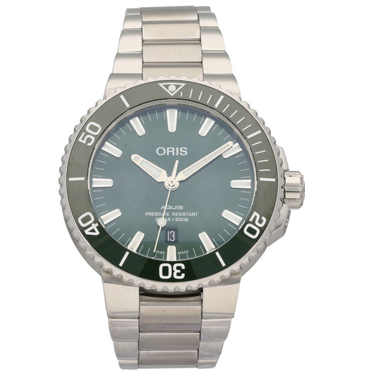 Oris Aquis 7730 Stainless steel diver watch with teal dial, numbered bezel, and metal bracelet