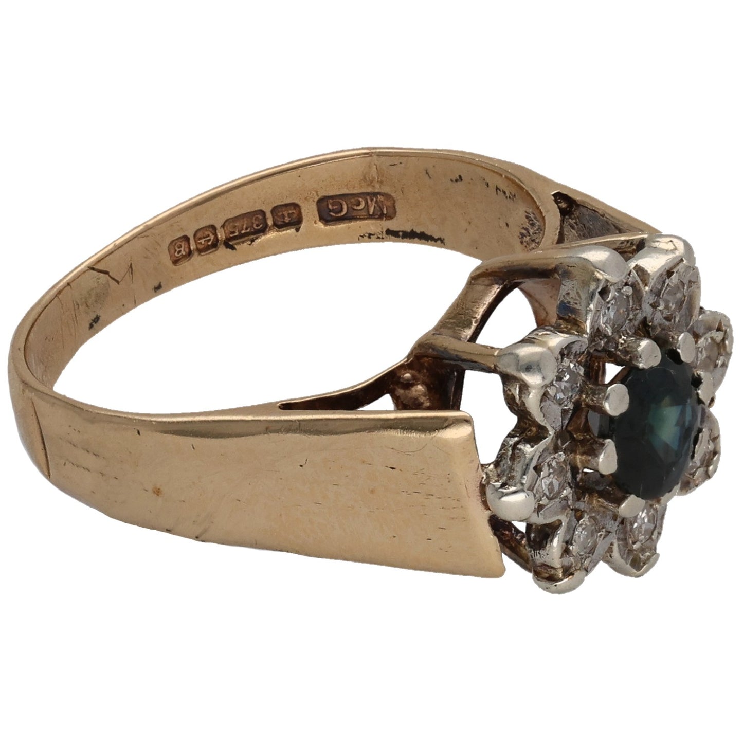 9ct gold dress ring side view with dark blue-green sapphire and diamond accents