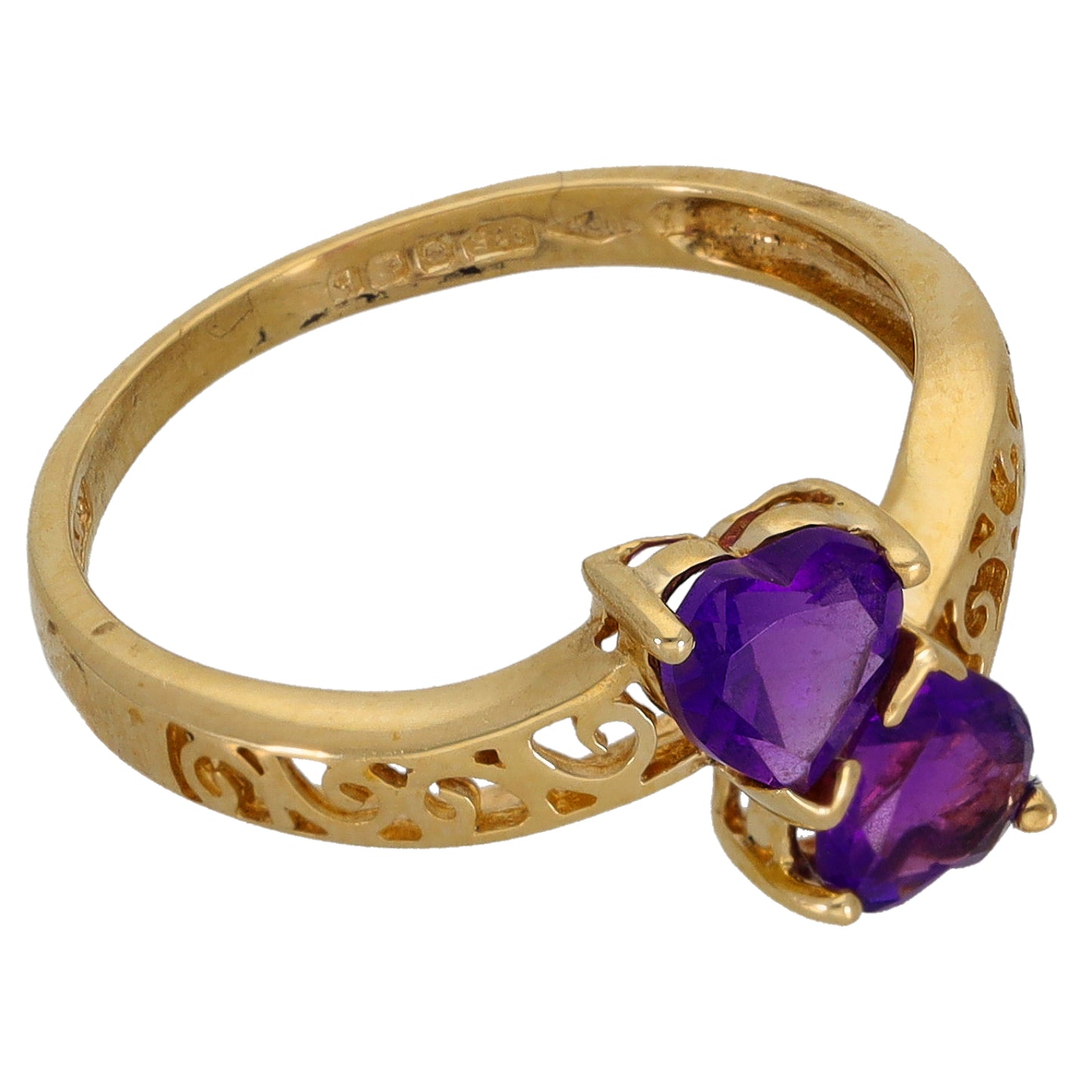 Gold ring with two purple amethyst heart-shaped stones in openwork setting