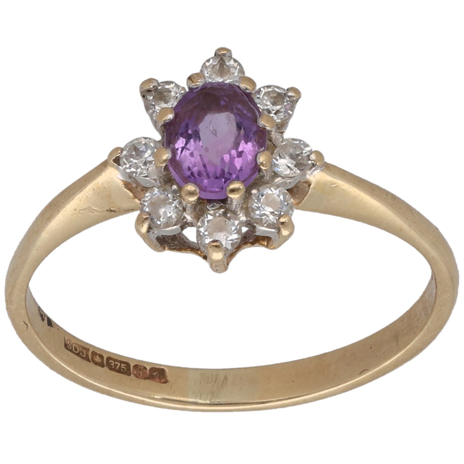 9ct gold cocktail ring with oval purple center and clear stone cluster