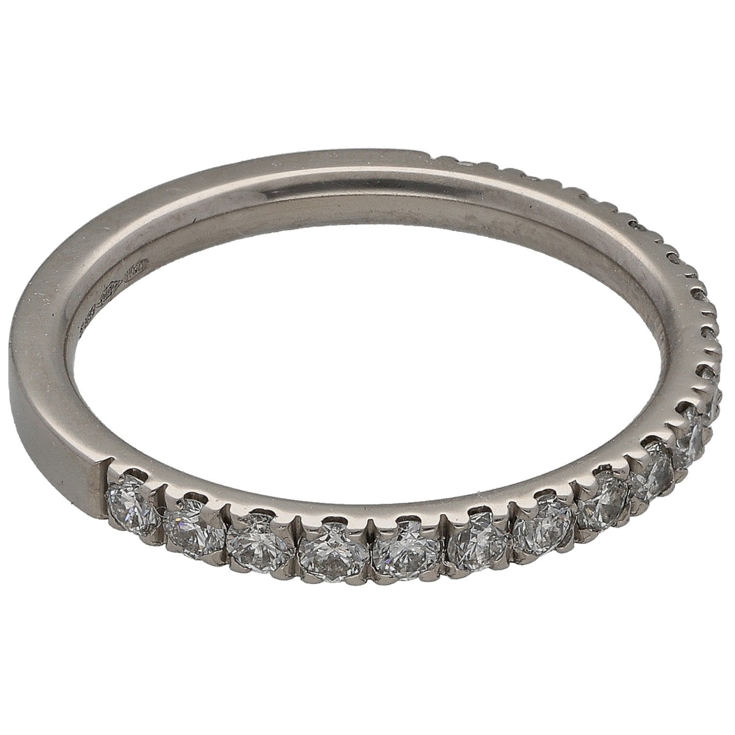 Platinum half eternity diamond ring, round-cut stones along the band, side view