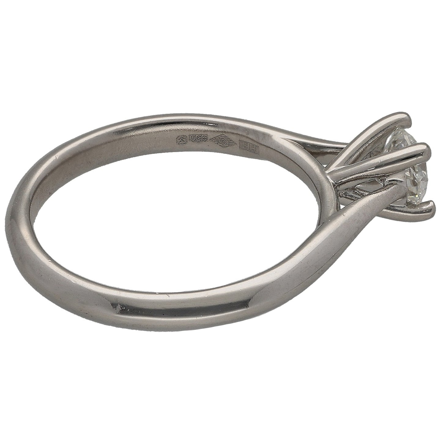Platinum solitaire diamond ring side view with prong-set round stone