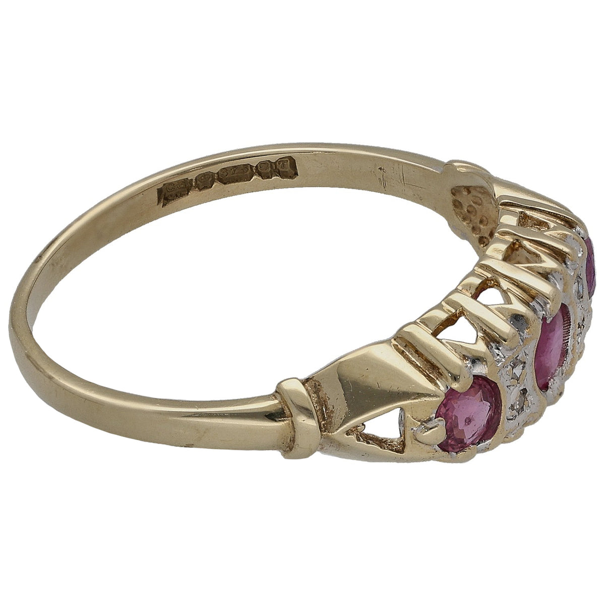Gold ring side view with clustered round purple stones and raised openwork prongs