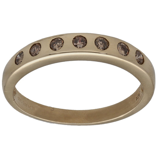 9ct gold half eternity ring with round dark diamonds across the top band
