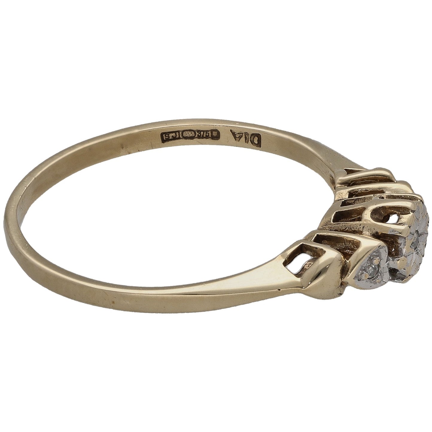 9ct gold three-stone ring with round diamond setting on band, side view