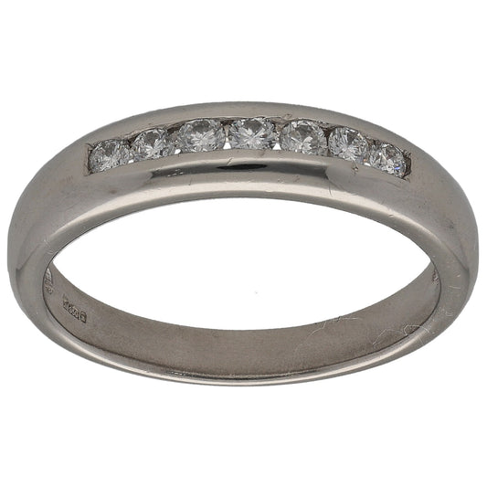 Platinum half-eternity ring with round-cut diamonds across the top band