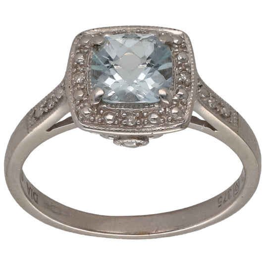 White gold aquamarine cocktail ring with halo of small round diamonds, size M