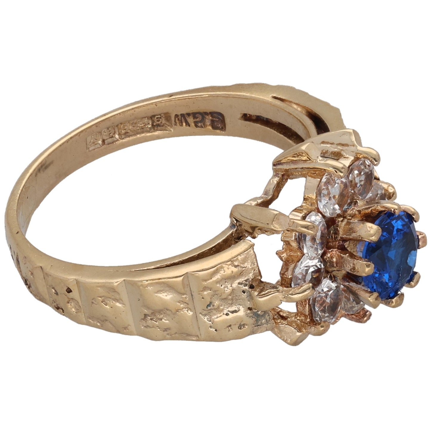 Gold-tone cocktail ring with blue and clear stones, textured band, side profile