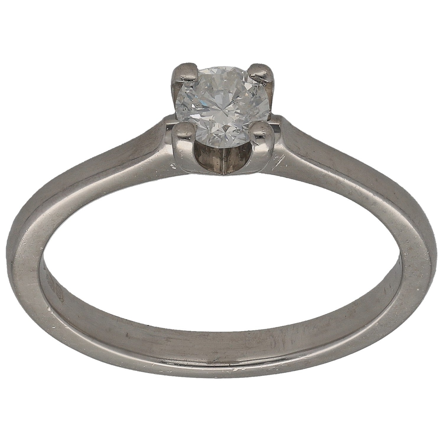 Platinum round diamond solitaire ring with four-prong setting, center stone visible