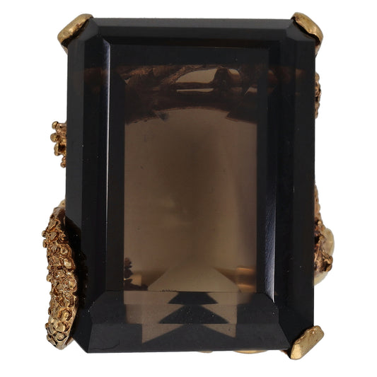 Gold smoky quartz single-stone ring with rectangular dark gemstone, ornate setting